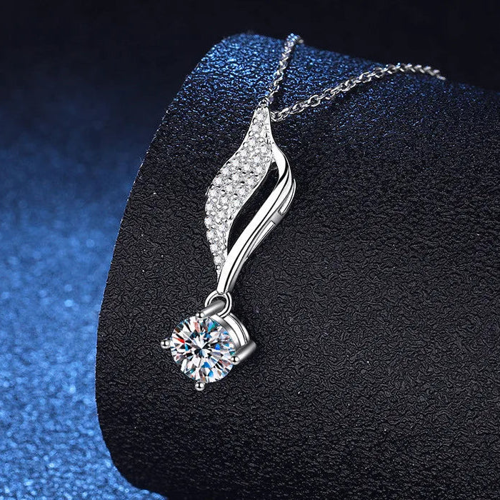 Silver necklace with a pendant on a dark background, featuring the brand 'Coderia'.