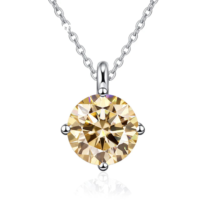 Gold round pendant necklace on a white background