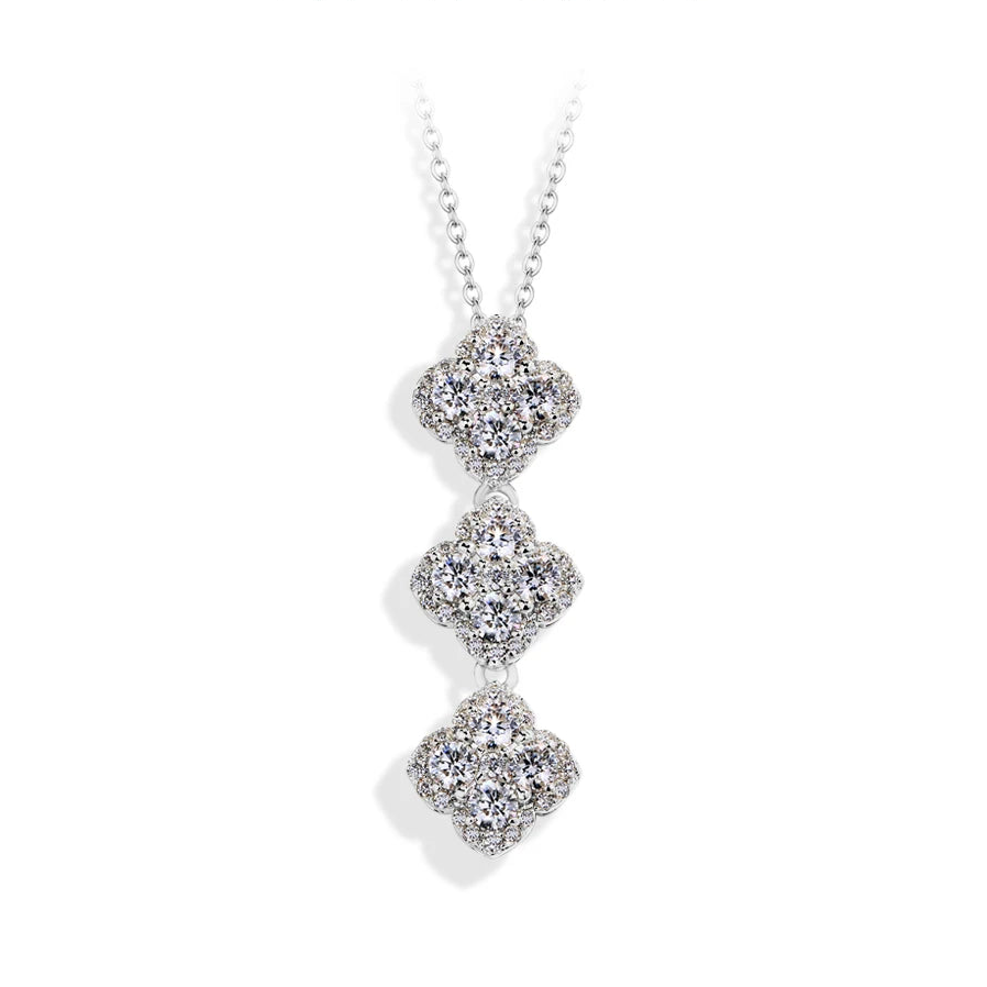 Diamond necklace with three pendants on a white background, branded 'Atta Gems'.