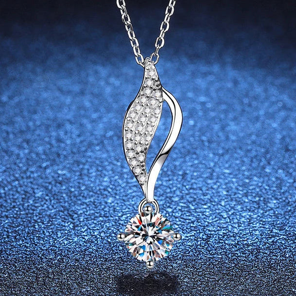 Silver pendant necklace with 'CODERIA' branding on a dark blue gradient background