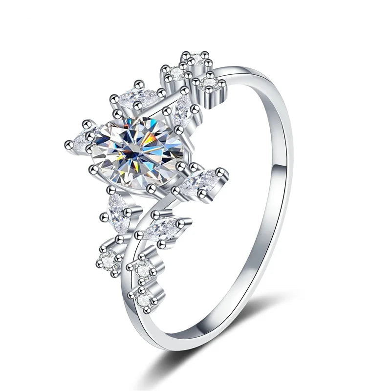 Silver ring with gemstones and 'CODERIA' branding on a white background